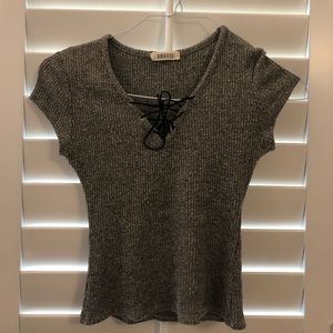 Grey shirt sleeve with tie up front